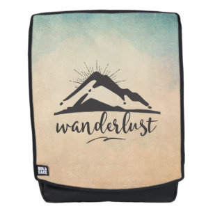 Berg met zonnestralen en Wanderlust-typografie Rugtassen