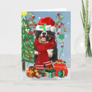 Bernese Mountain Dog in sneeuw met kerstcadeaus Kaart