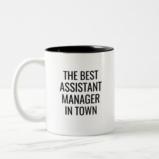 Beste assistent manager in de stad tweekleurige koffiemok (Links)