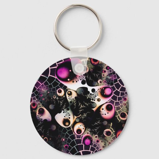 Besteld Chaos. 2 Sleutelhanger (Voorkant)