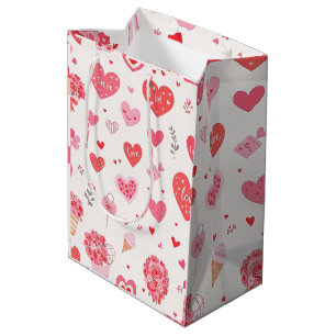Bevallige Valentijnsdesign met harten en bloemen Medium Cadeauzakje