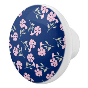 Bevalligend roze bloempatroon op marineblauw keramische knop