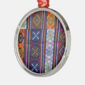 Bhutanese textielstof metalen ornament (Links)