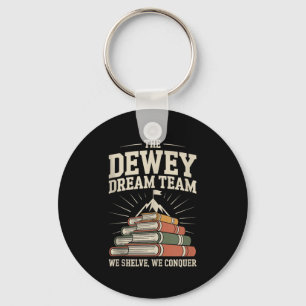 Bibliotheek Dream Team Berg van boeken Grappige Bi Sleutelhanger
