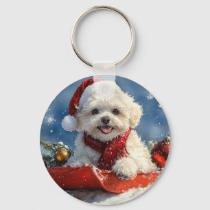 Bichon Frise-hond in slee Laat het sneeuwen Kerstm Sleutelhanger