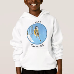 Bickadee sur la peinture d'alimentation - Oiseaux