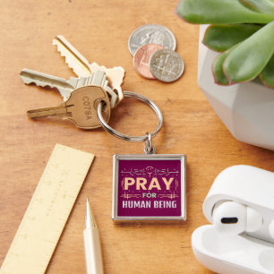 Bid voor de mens sleutelhanger