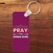 Bid voor de mens sleutelhanger (Achterkant)