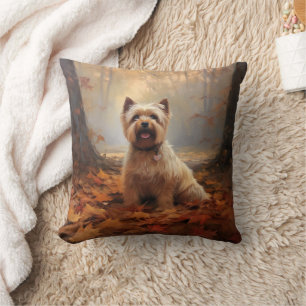 Biewer Terrier in herfstbladeren val inspireert Kussen