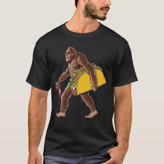 Bigfoot Carrying A Taco And A Bottle Of Hot Sauce  T-shirt