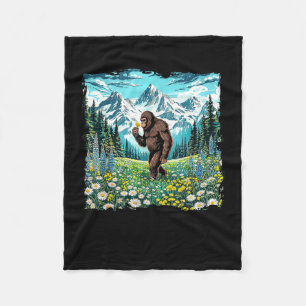 Bigfoot loopt in bloemenveld bos sasquatch fleece deken