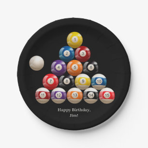 Biljartballen op zwart papieren bordje