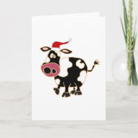 Black and White Cow in Santa Hat