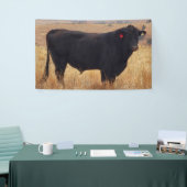 Black Angus Steer Grazing met zijn herd Spandoek (Beurs)