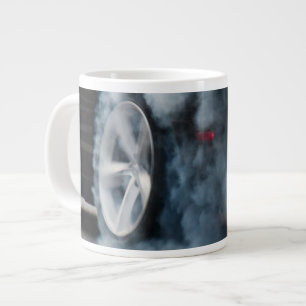 Black car burnout grote koffiekop