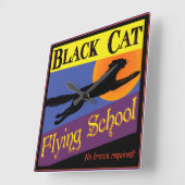Black Cat Flying School Rétro Horloge murale (Angle)