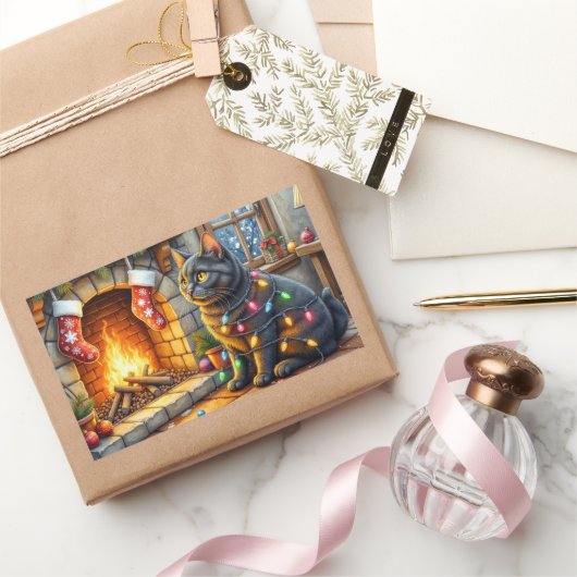 Black Cat Sitting Fireplace with Christmas Lights Rechthoekige Sticker (Geschenken)