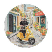 Black Doodle Riding Scooter European City Streets Snijplank (Voorkant)
