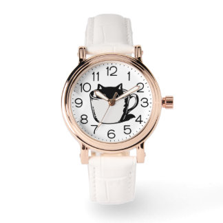 Black kitten with red nose hiding in a cup horloge