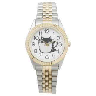 Black kitten with red nose hiding in a cup horloge