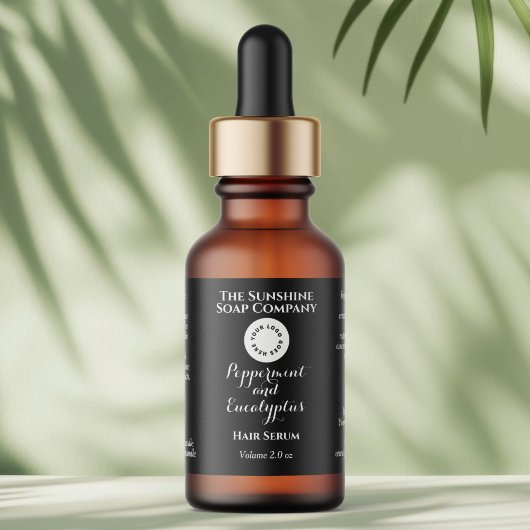 Black w curly text and logo dropper bottle label 