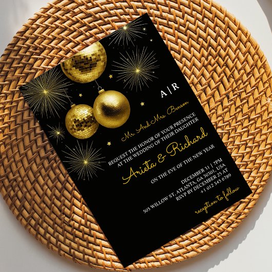 Black wedding invitation with gold text