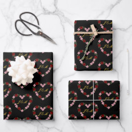 Black wrapping paper with a pink and red heart