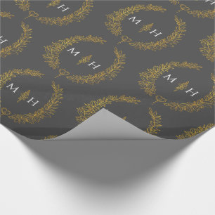 Bladovaal monogram tekengoud op donkergrijs cadeaupapier