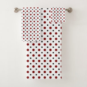 Blanc avec des pois noirs et rouges
