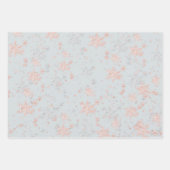 Blanzend roze goud en zilversneeuwvlokken van grij inpakpapier vel (Voorkant)