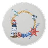 Blauw anker en schelpen op turquoise keramische knop (Voorkant)