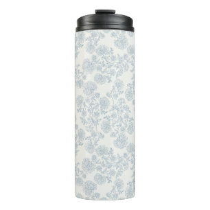 Blauw bloemmotief vintage inpakpapier met botanisc thermosbeker