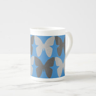 Blauw en grijs vlinderpatroon porselein kop