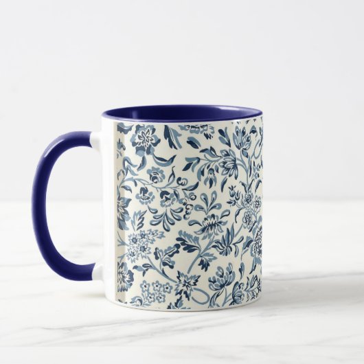  blauw en wit bloempatroon mok (Links)