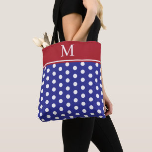 Blauw en wit stippenpatroon met rode monogram draagtas
