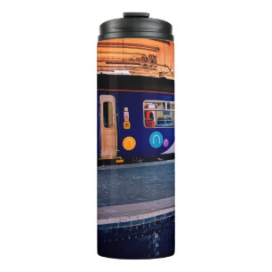 Blauw en zilver thermosbeker