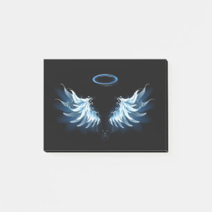 Blauw gloeiende engelenvleugels op zwarte achtergr post-it® notes