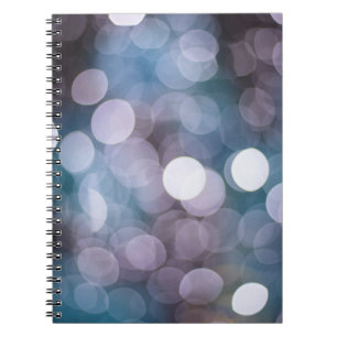 Blauw grijs bokeh, abstracte achtergrond. notitieboek