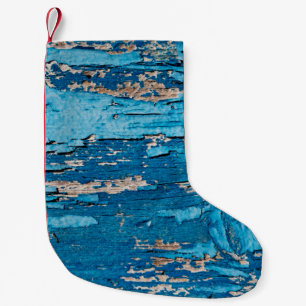 Blauw oude houten achtergrond kleine kerstsok