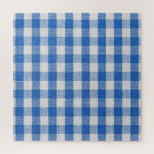 Blauw-wit gevoerde eetkleren. legpuzzel