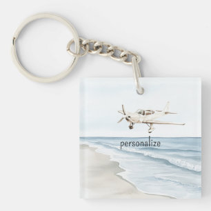 Blauw-witte vliegtuigen sleutelhanger