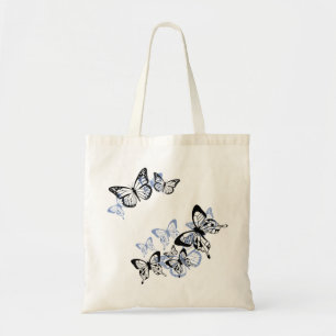 Blauw-zwarte stencilvlinders tote bag