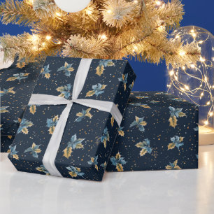 Blauwe achtergrond met gouden en blauwe hulstblade cadeaupapier