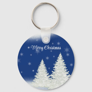 Blauwe achtergrond met kerstboom sleutelhanger