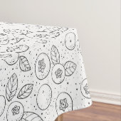 Blauwe bessen op zwart en wit tafelkleed (Voorbeeld)