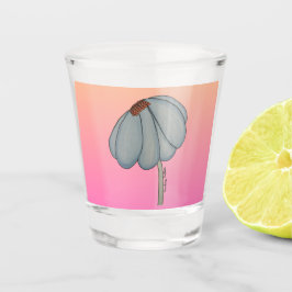 Blauwe bloem met roze achtergrond shot glas