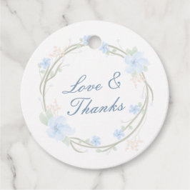 Blauwe bloemkrans rond bedankjes labels