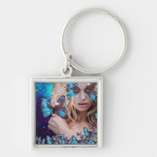 BLAUWE BUTTERFLES MET GROENE GOUDEN SLEUTELHANGER