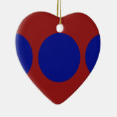 Blauwe cirkels op rood keramisch ornament (Rechts)