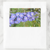 Blauwe delfiniumbloemen rechthoekige sticker (Tas)